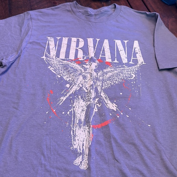 NWOT. Woman’s size L. (No size written but it’s L) Nirvana blue T-shirt. - Picture 2 of 3